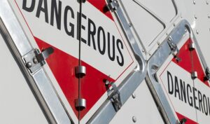 shipping hazardous materials dangerous sign on truck
